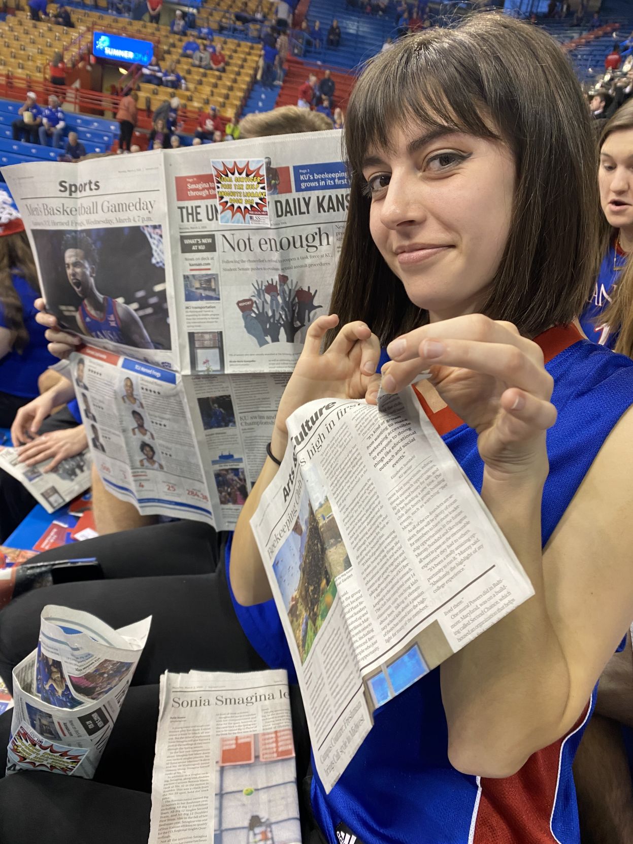 Rylie Koester tears up a U.D.K. in the student section of Allen Fieldhouse